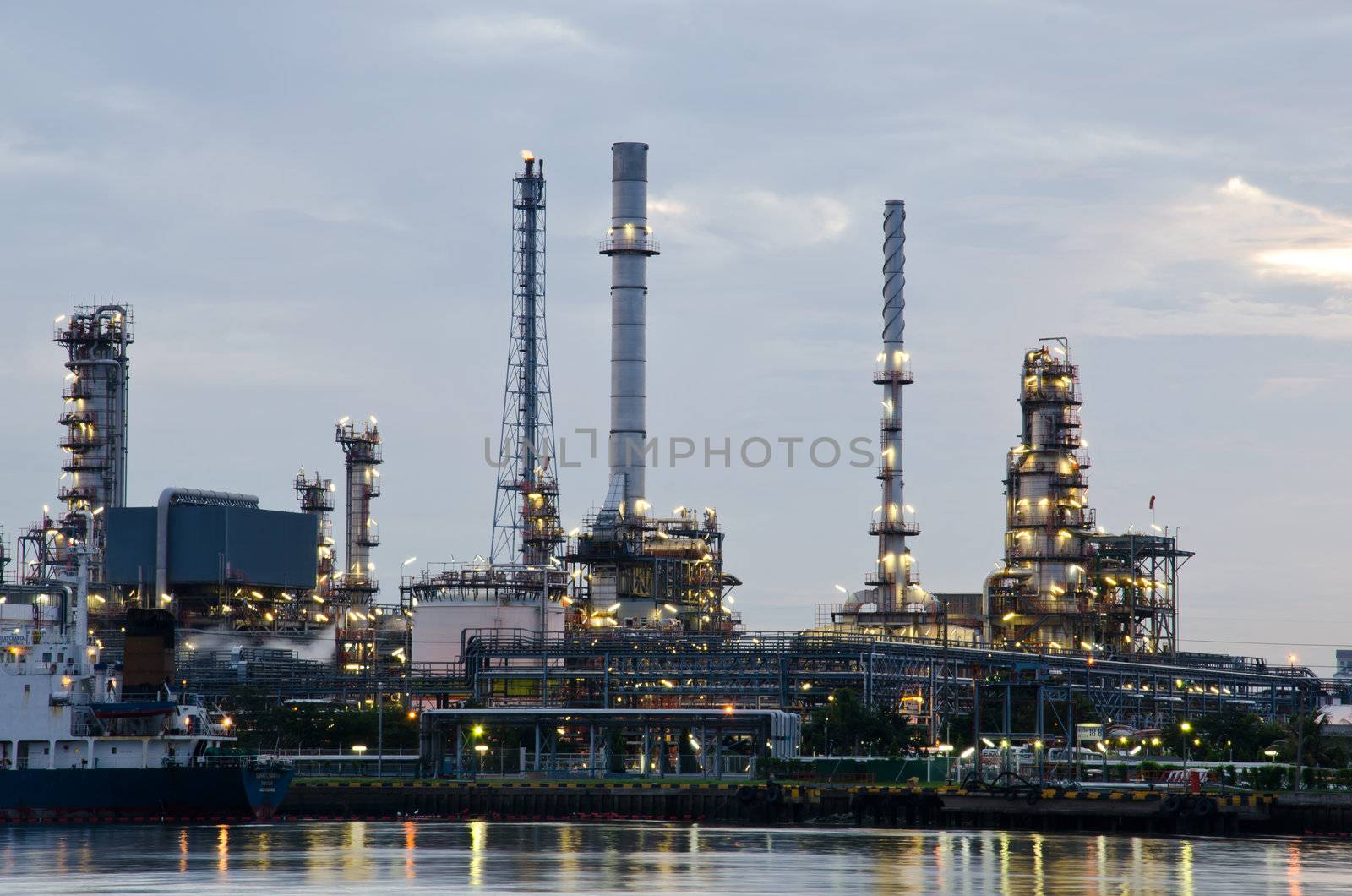 Oil refinery plant in the dawn, Chao Phraya river, Thailand