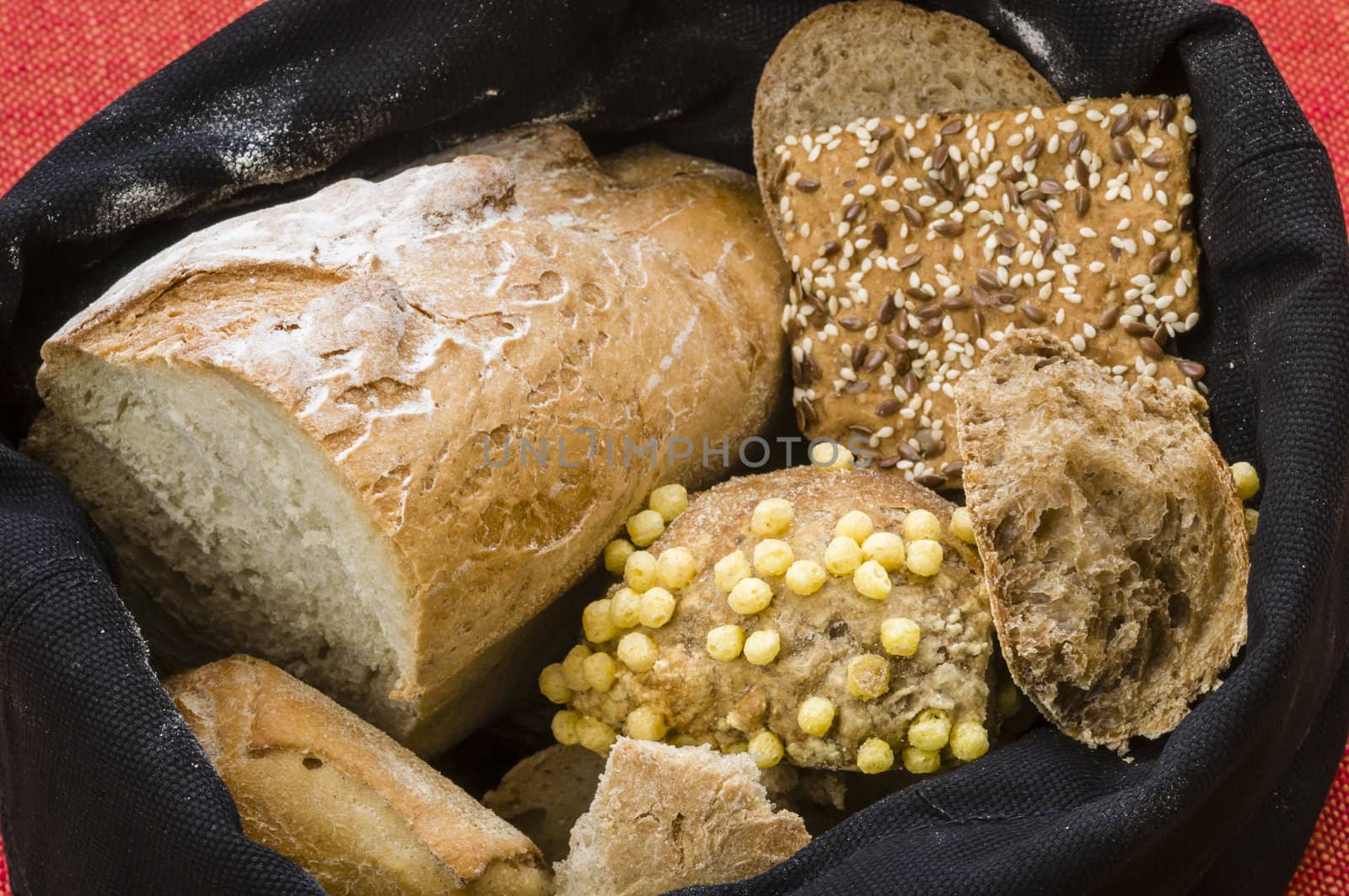 Black bag of different types of bread