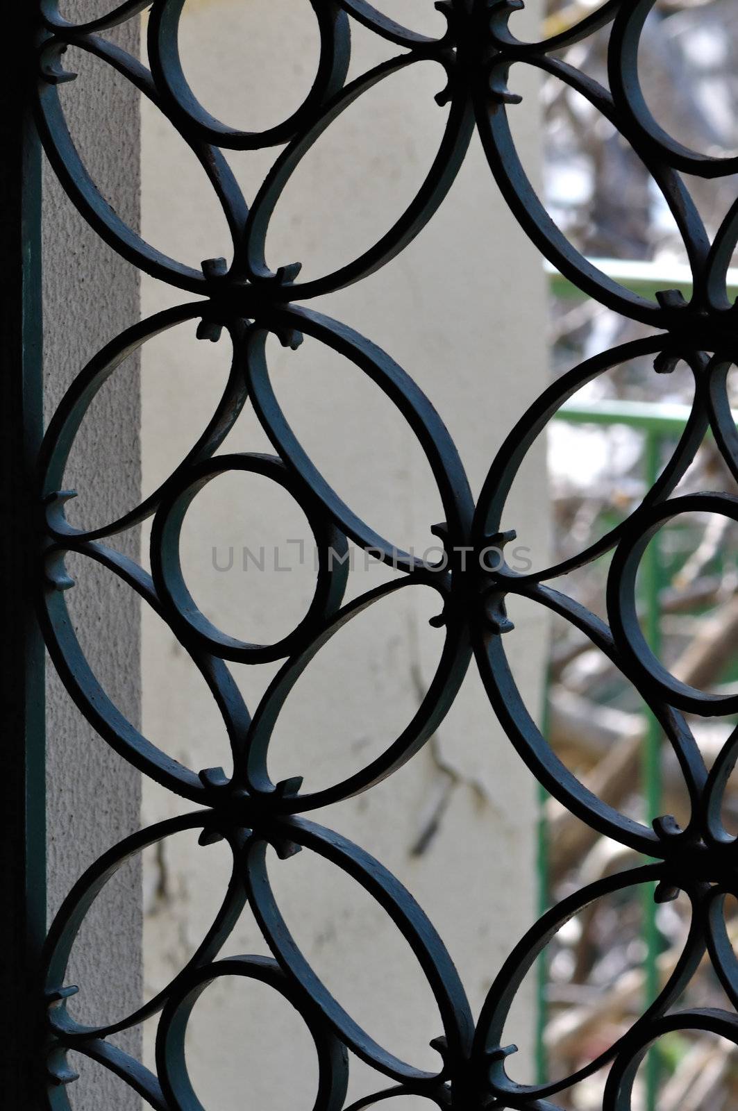 Vintage metal door frame with decorative circles pattern. Abstract background.