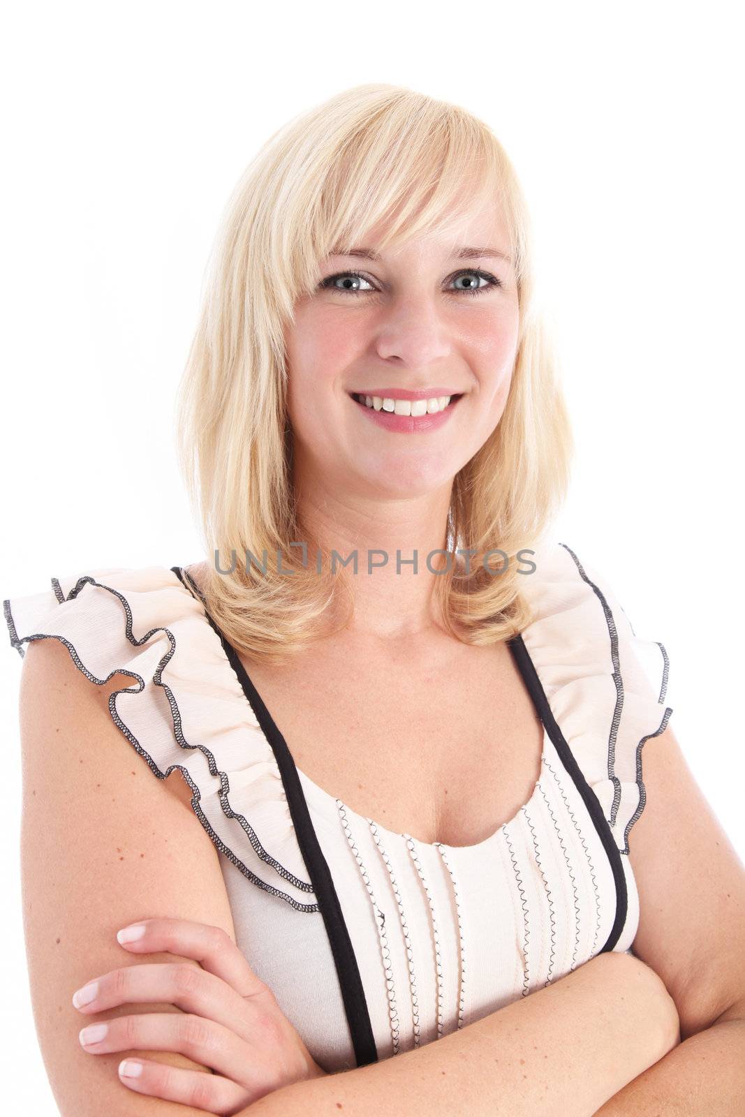 Studio shot of attractive blonde woman with arms folded isolated on white Studio shot of attractive blonde woman with arms folded isolated on white