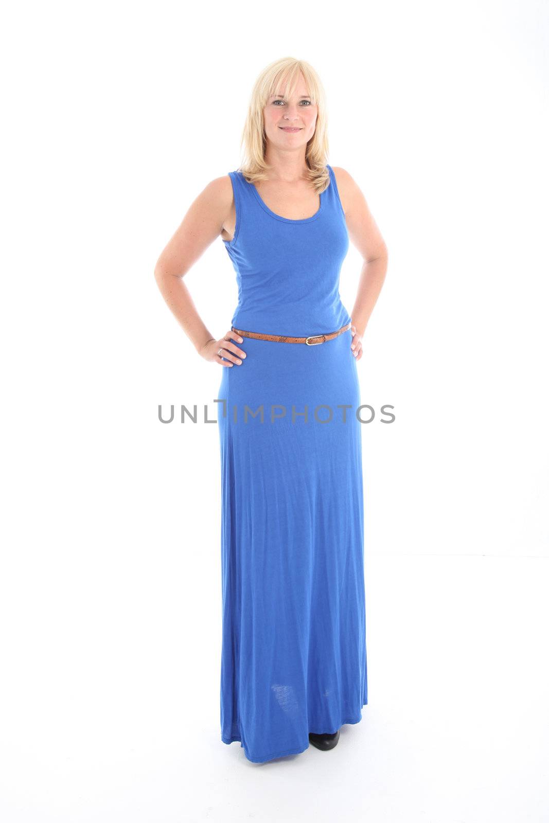 Studio shot of attractive blonde woman in blue dress isolated on white Studio shot of attractive blonde woman in blue dress isolated on white