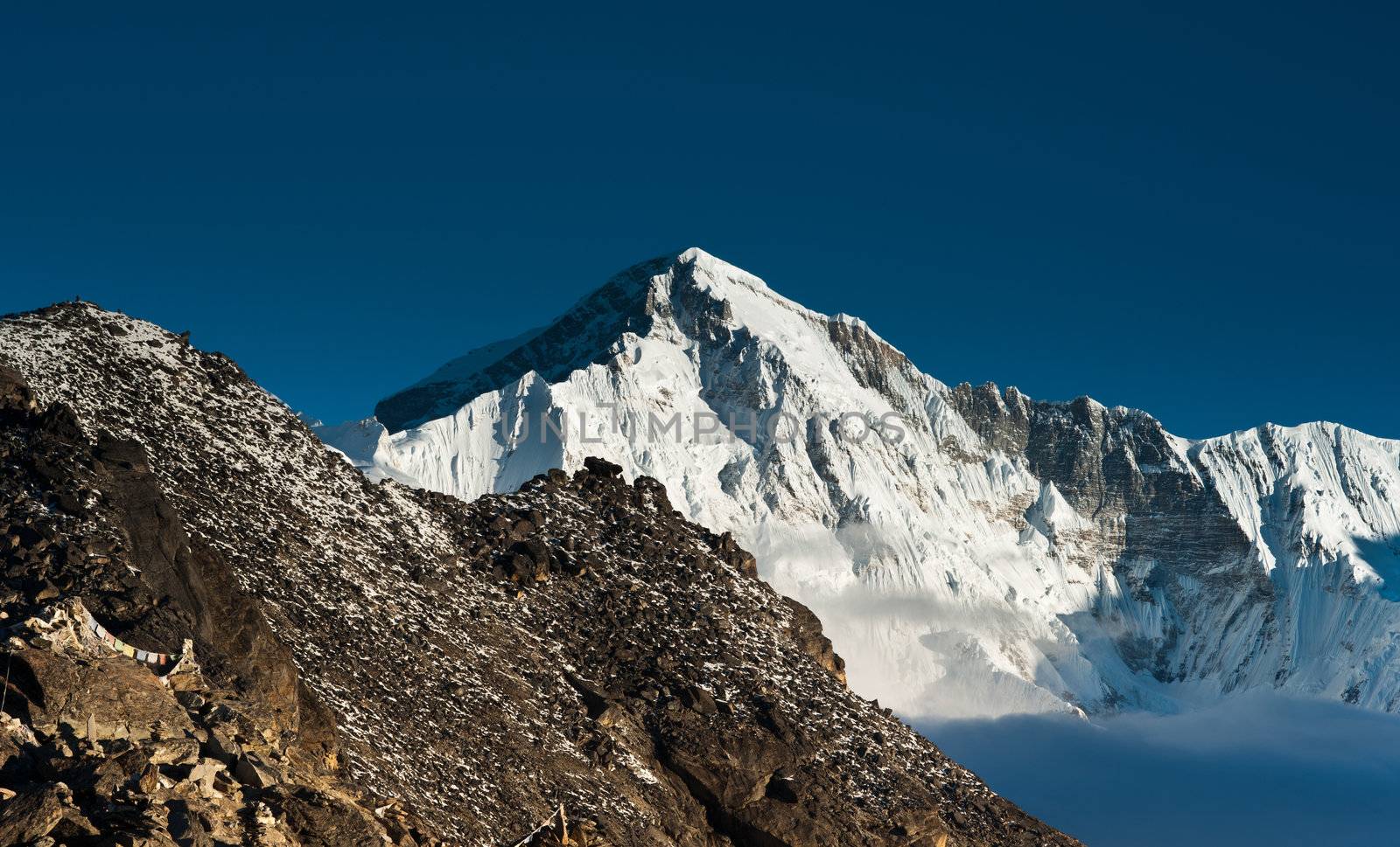 On top of Gokyo Ri: Peaks and clouds. At height 5483 m