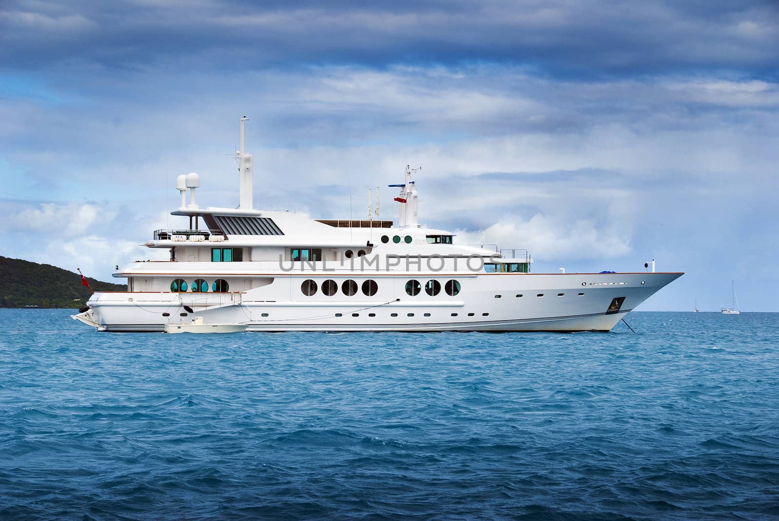 A large private motor yacht out at sea