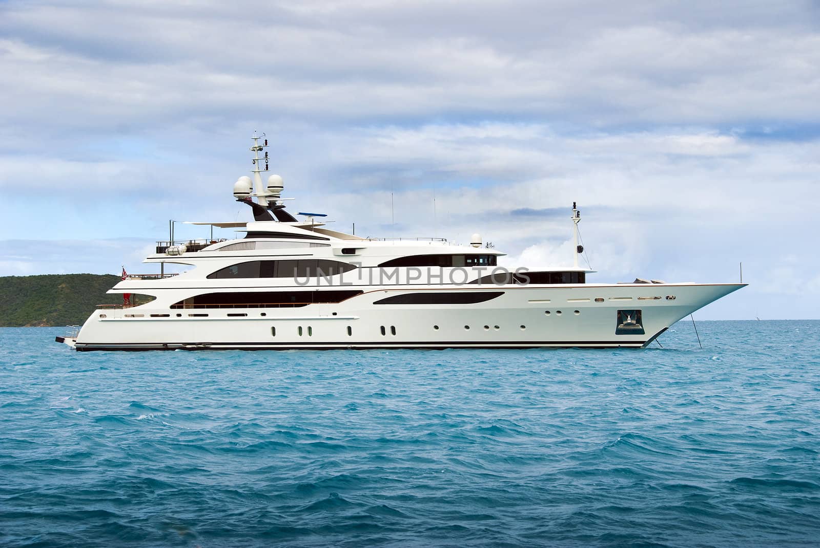A large private motor yacht out at sea