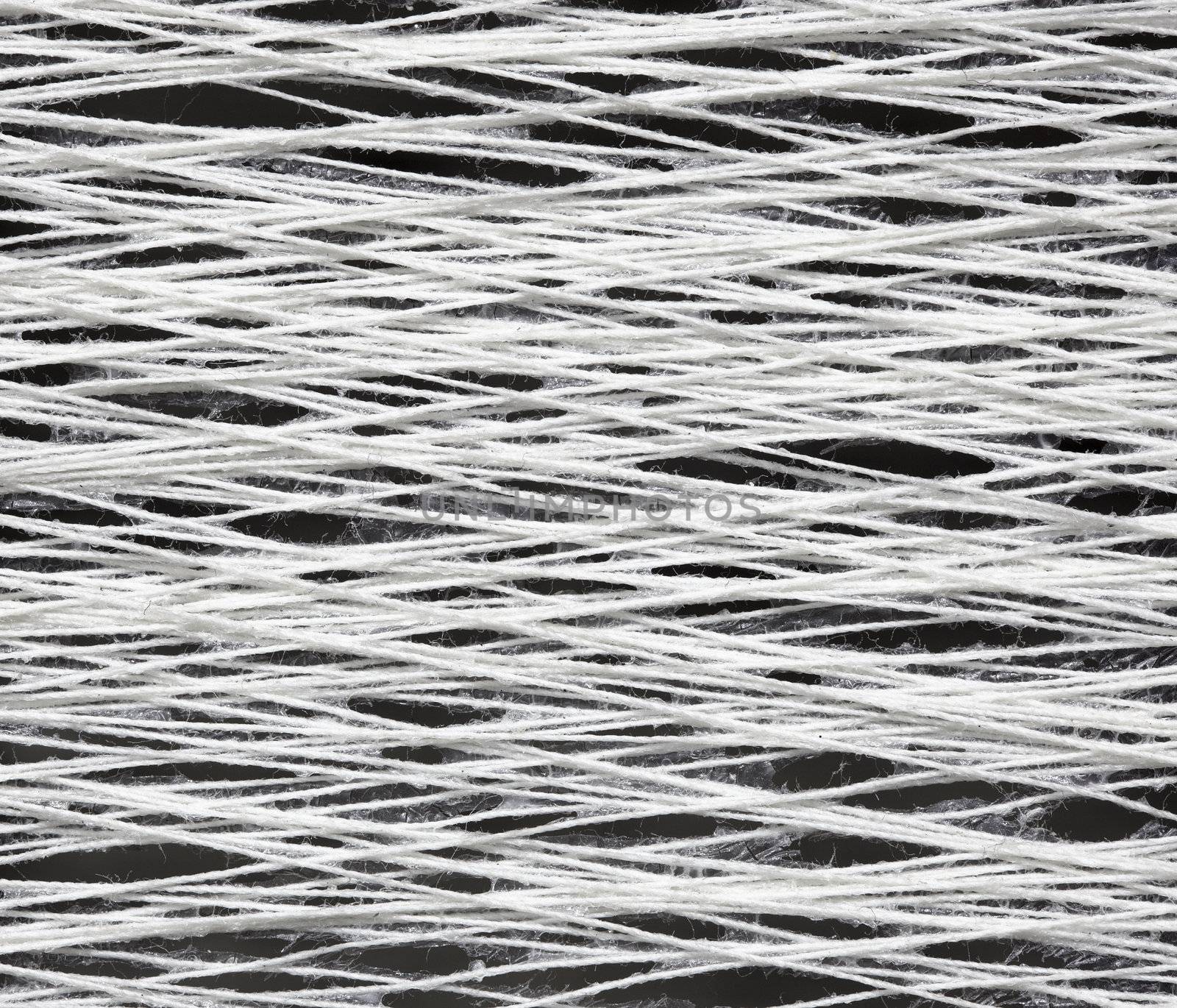 The texture of the yarn with glue - close-up