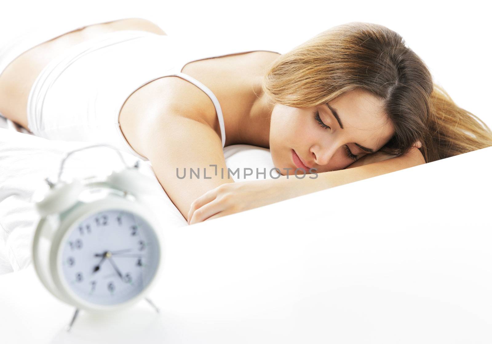 A young lady sleeping on the background with a clock on the foreground.