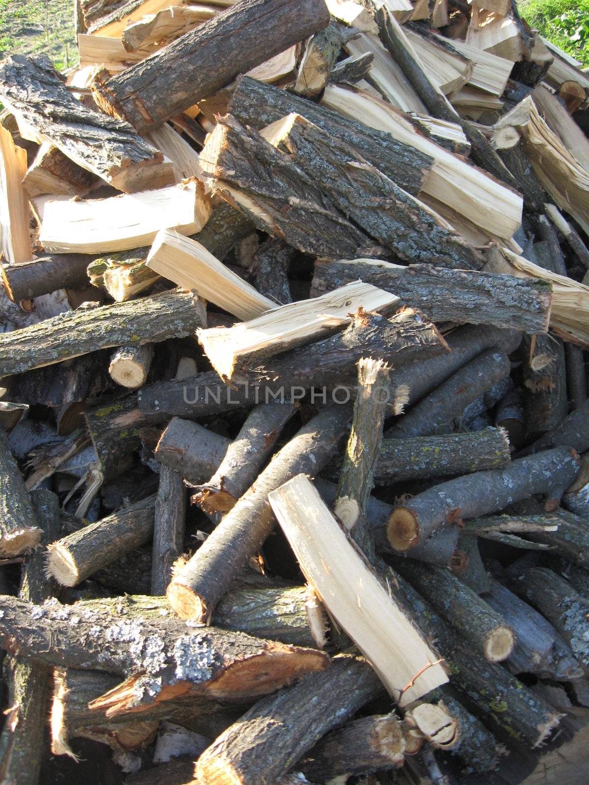 The image of heap of the prepared fire wood