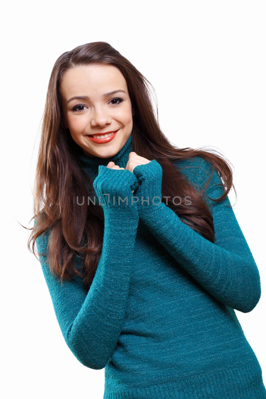 Young pretty woman with long hair wearing warm pullover