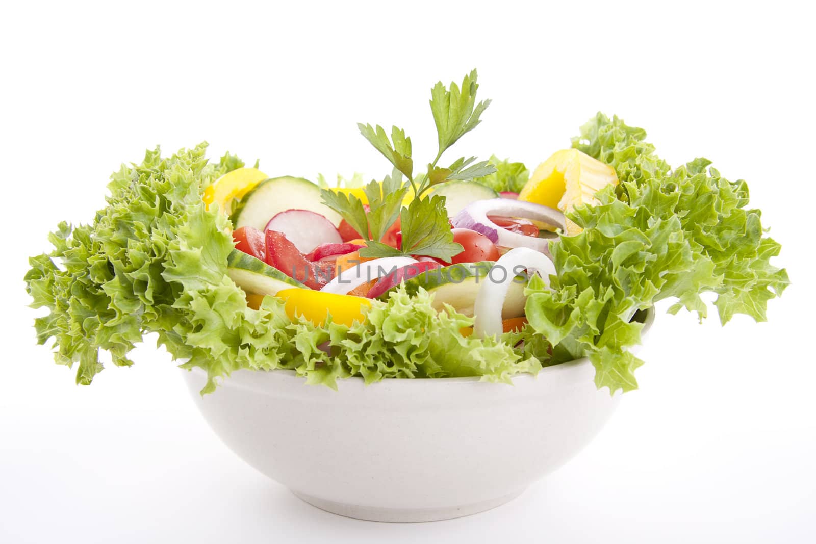 fresh tasty healthy salad with different vegetables isolated on white background