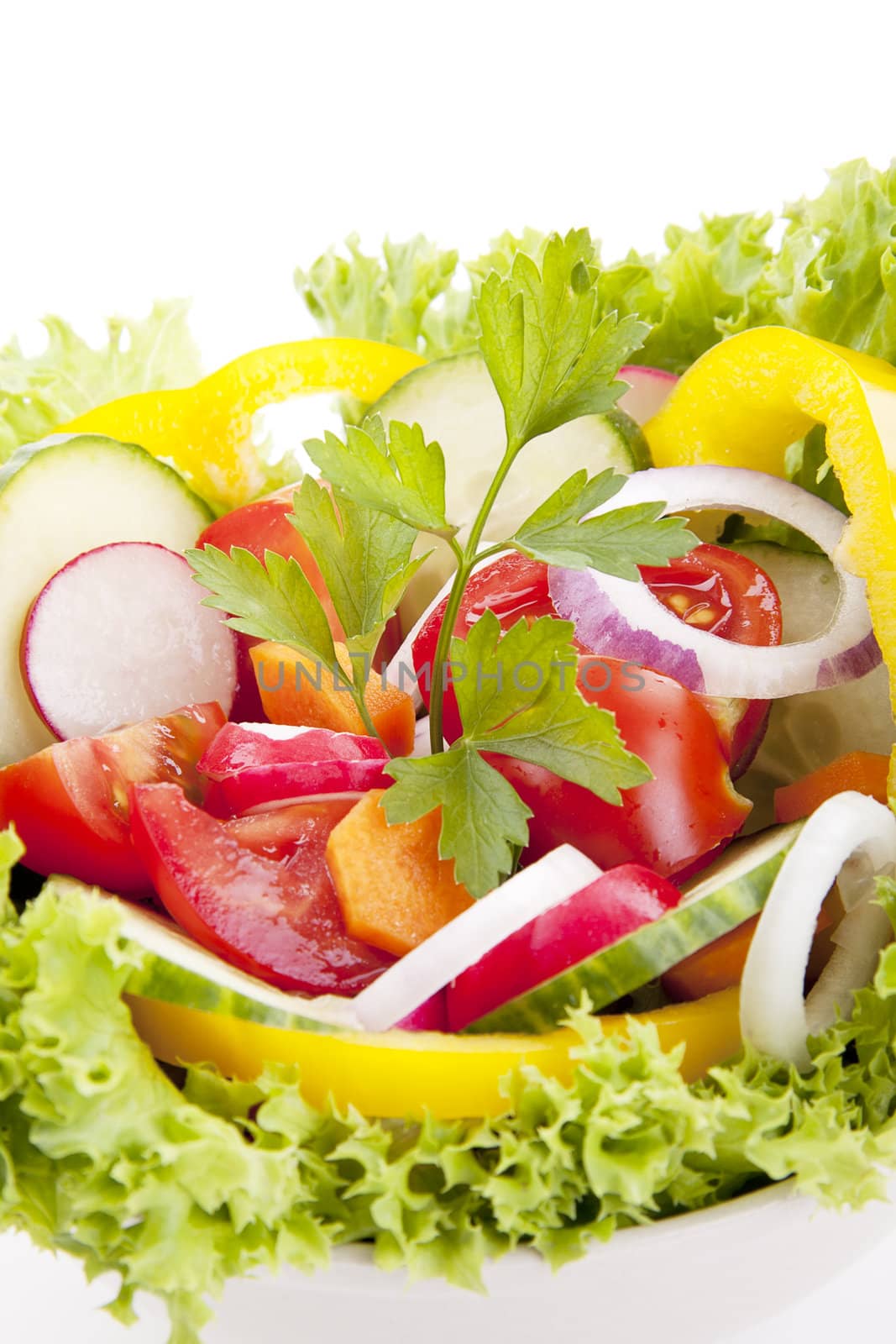 fresh tasty healthy salad with different vegetables isolated on white background