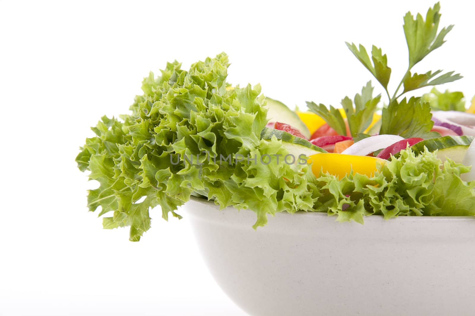 fresh tasty healthy salad with different vegetables isolated on white background