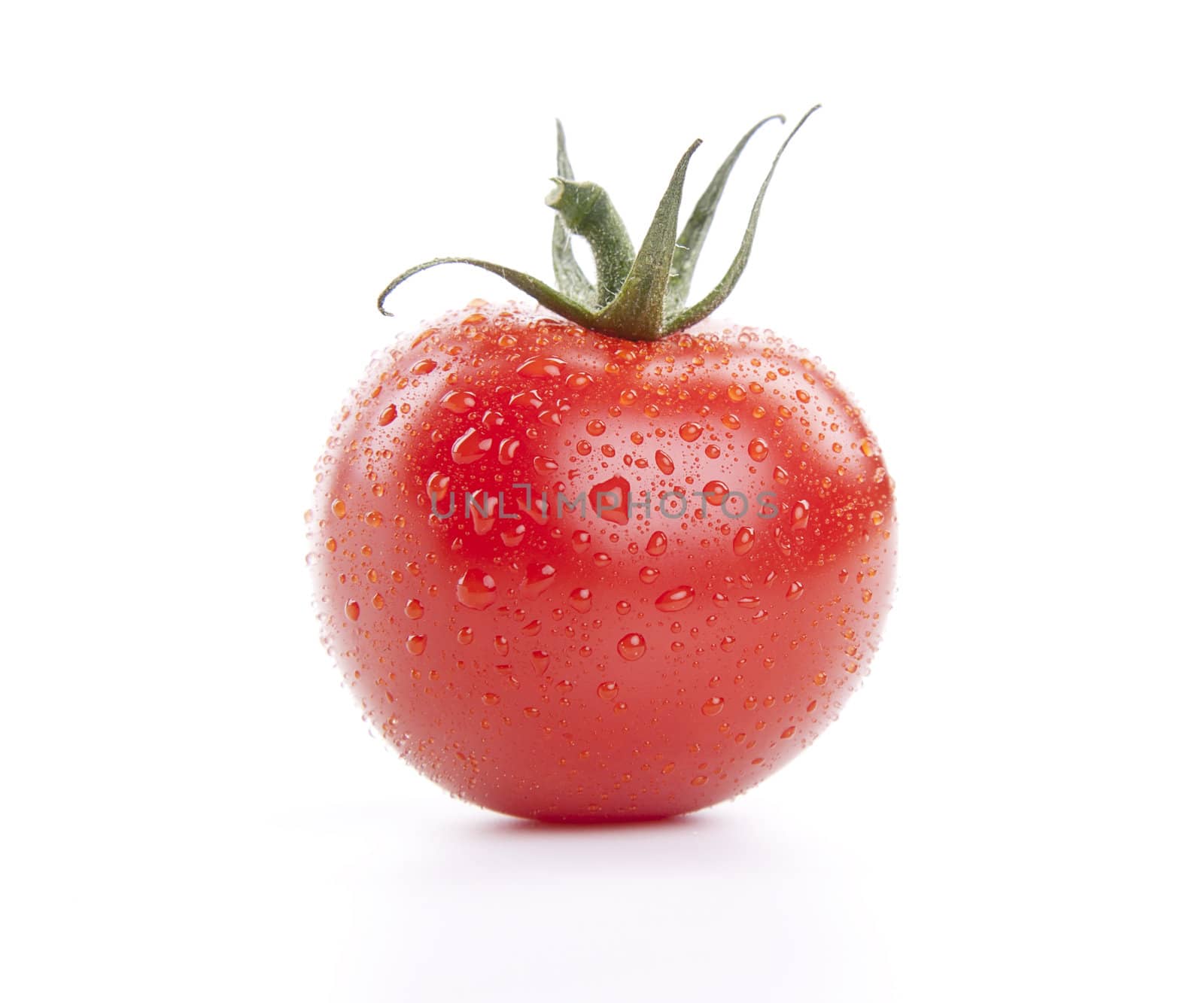 fresh red tomatoes with balsamic and oilve oil isolated on white background