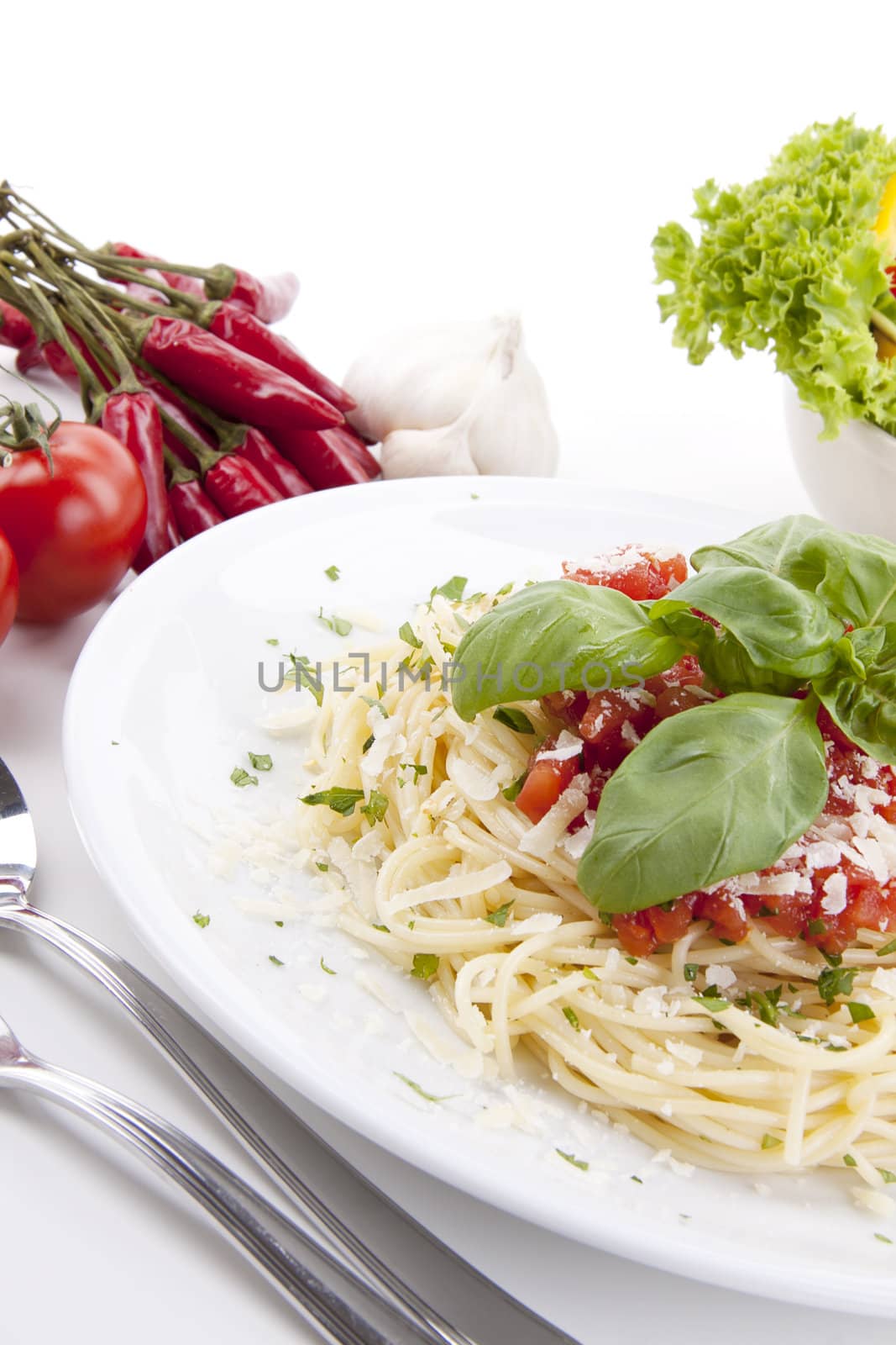 tatsty fresh spaghetti with tomato sauce and parmesan isolated on white background