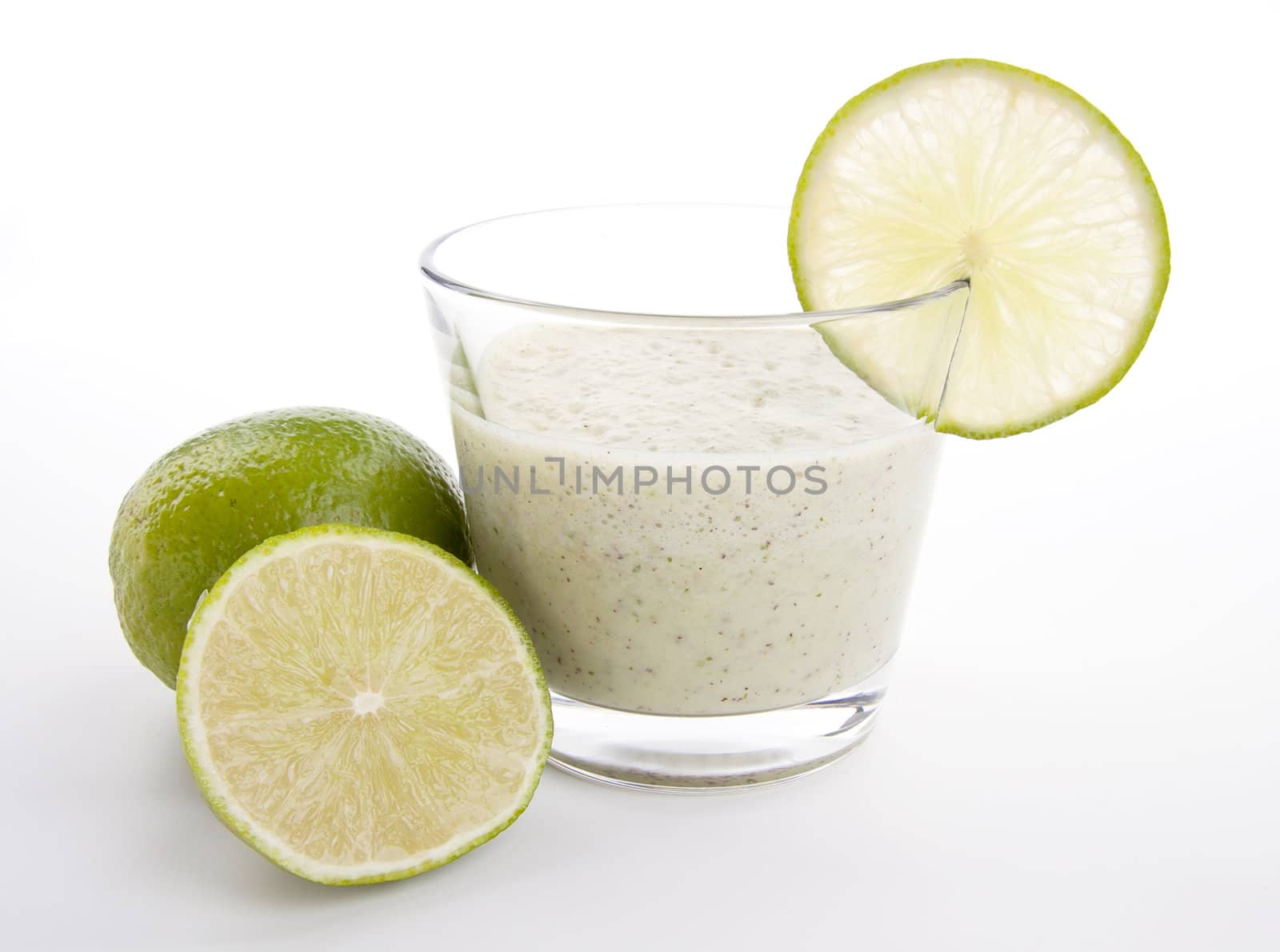 fresh tasty lime citrus yoghurt shake dessert isolated on white background