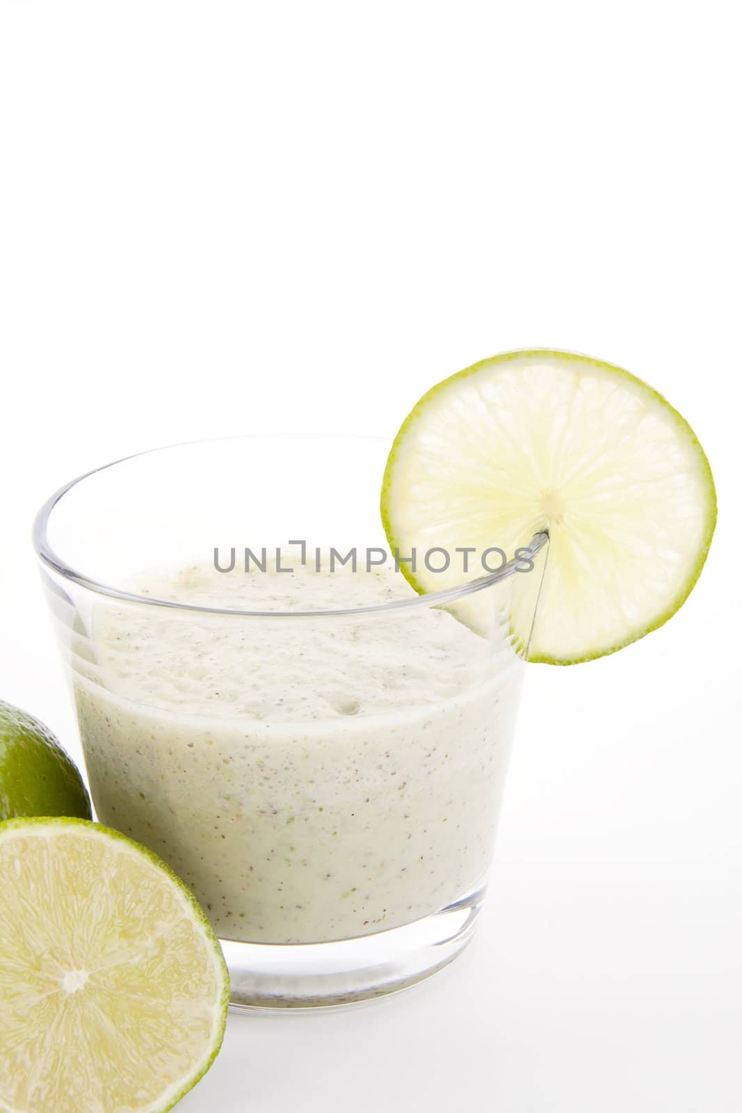 fresh tasty lime citrus yoghurt shake dessert isolated on white background
