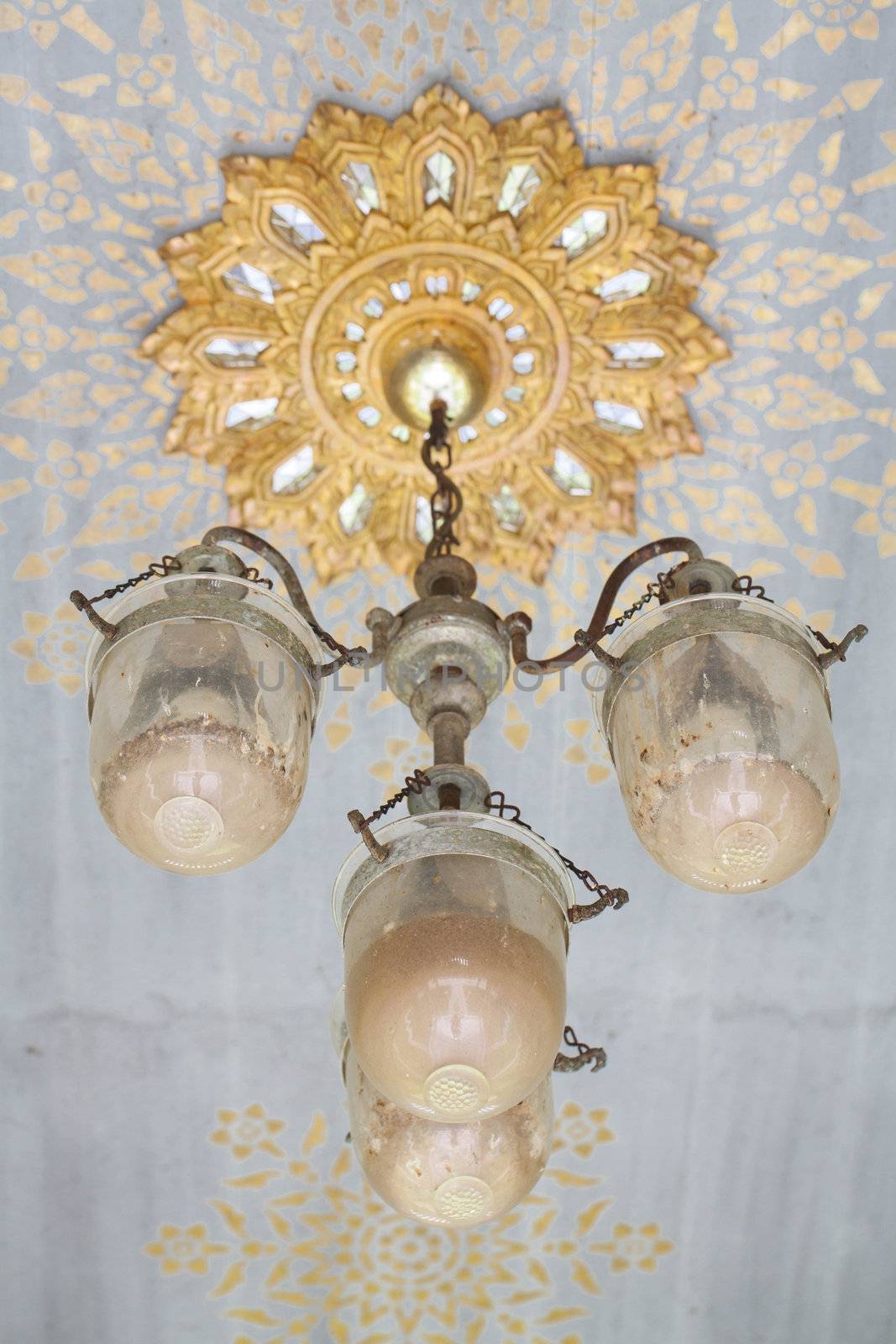 Antique lamp on the ceiling.