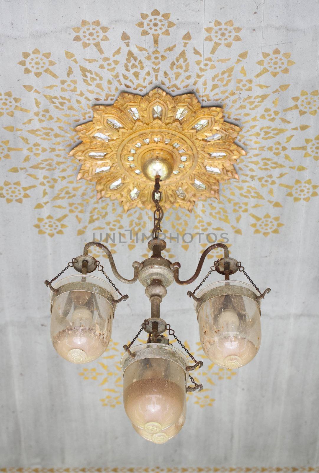 Antique lamp on the ceiling.