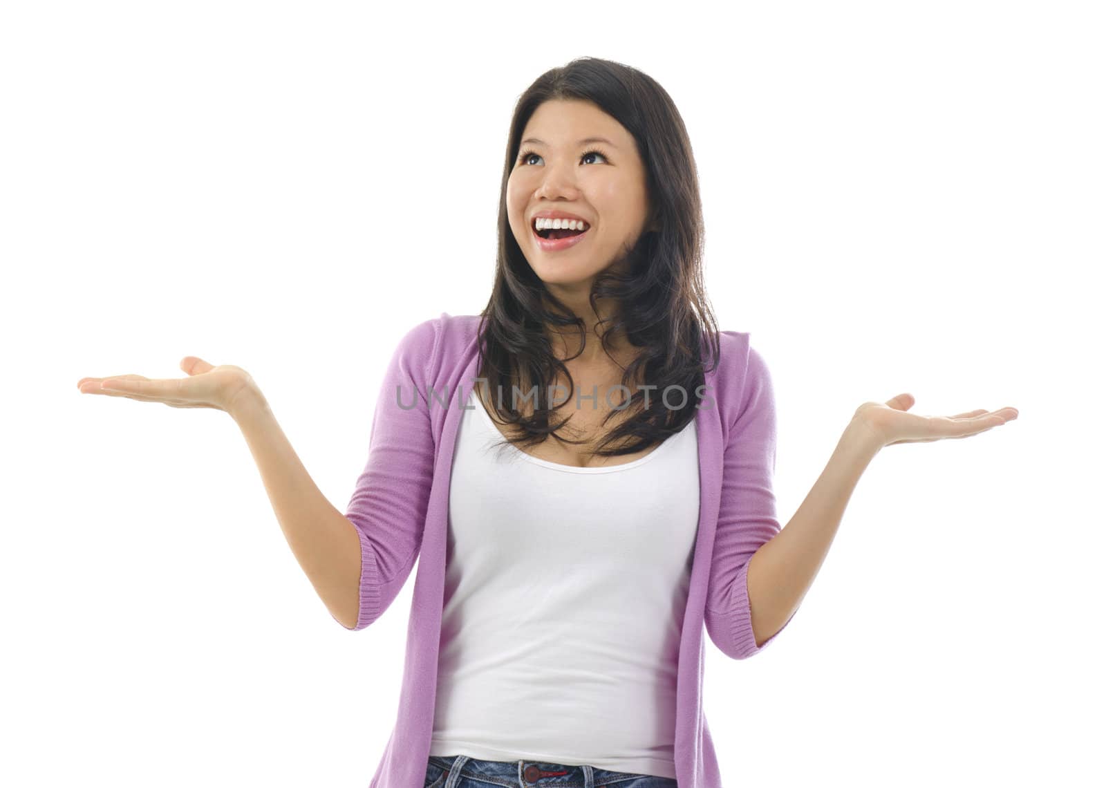 Happy Asian woman open her arms with surprising face over white background