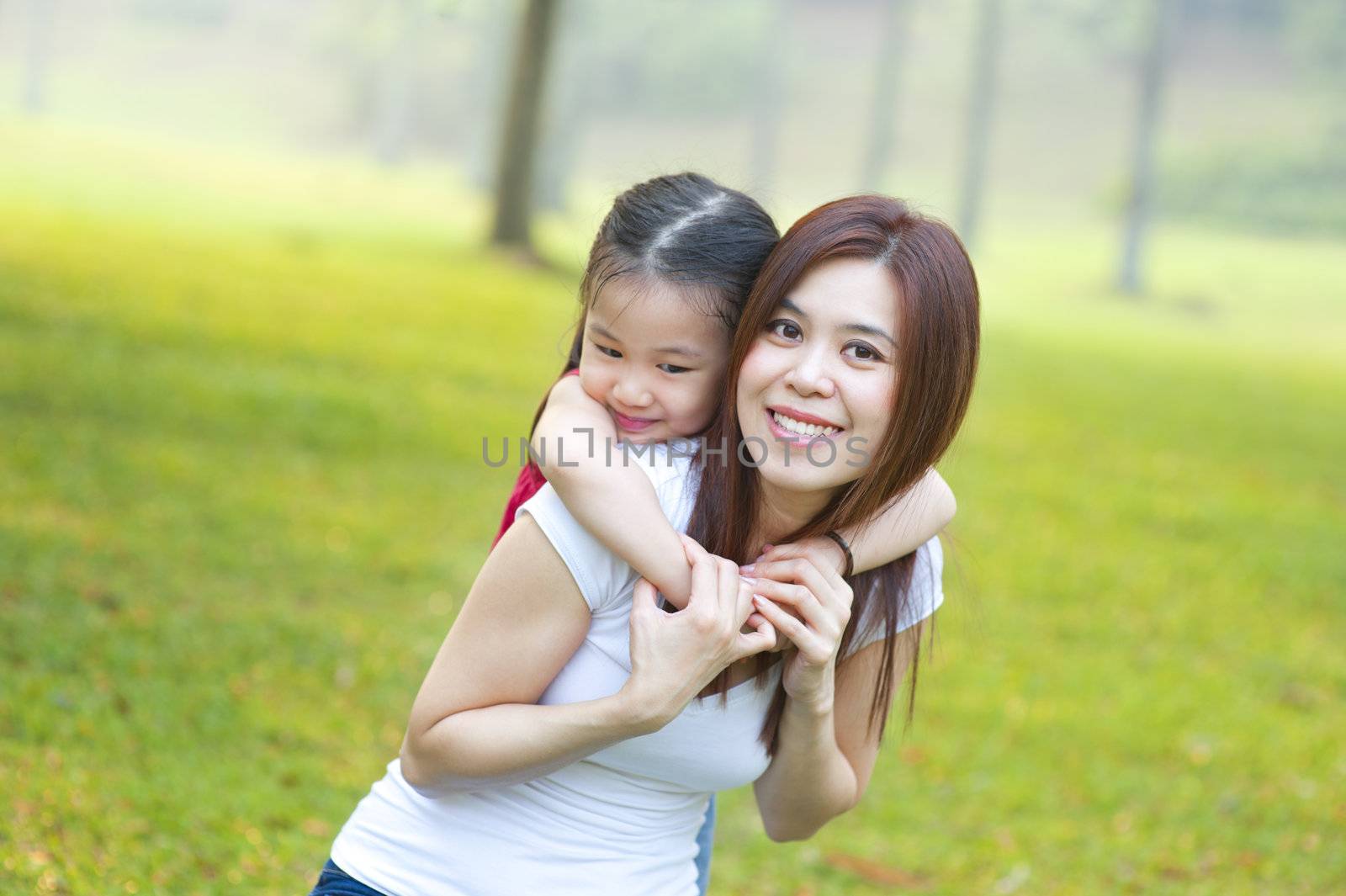 Happy Asian mother and daughter by szefei