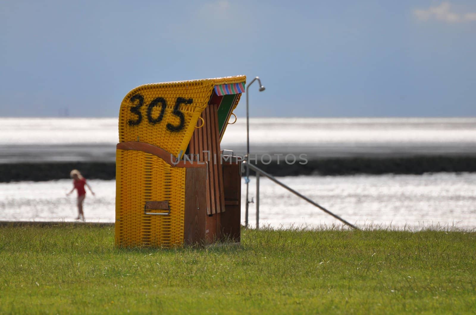 A beach chair in the meadow