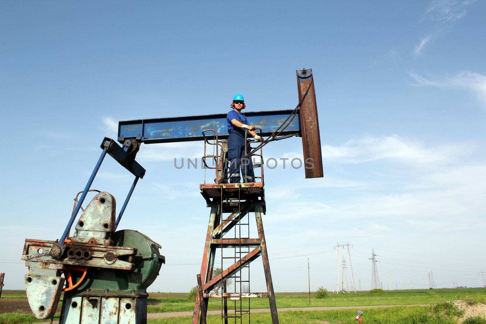 oil worker and pump jack industry scene by goce