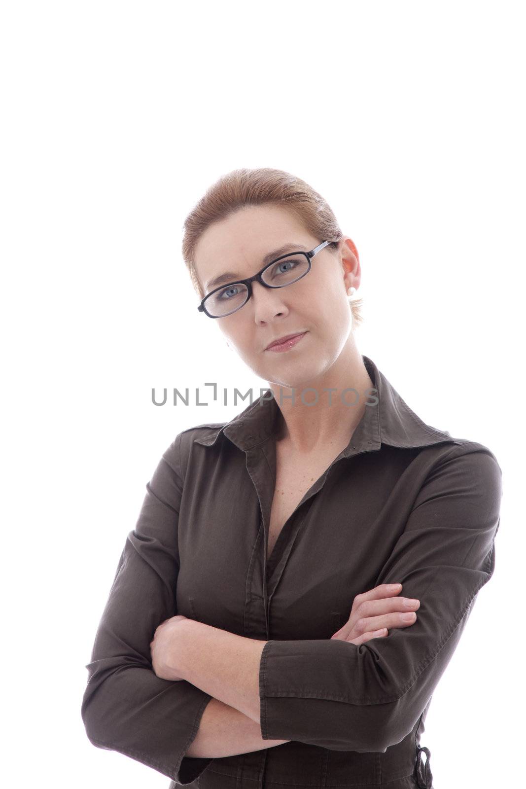 Woman wearing glasses standing with her arms folded looking at the viewer with an intent look, isolated on white