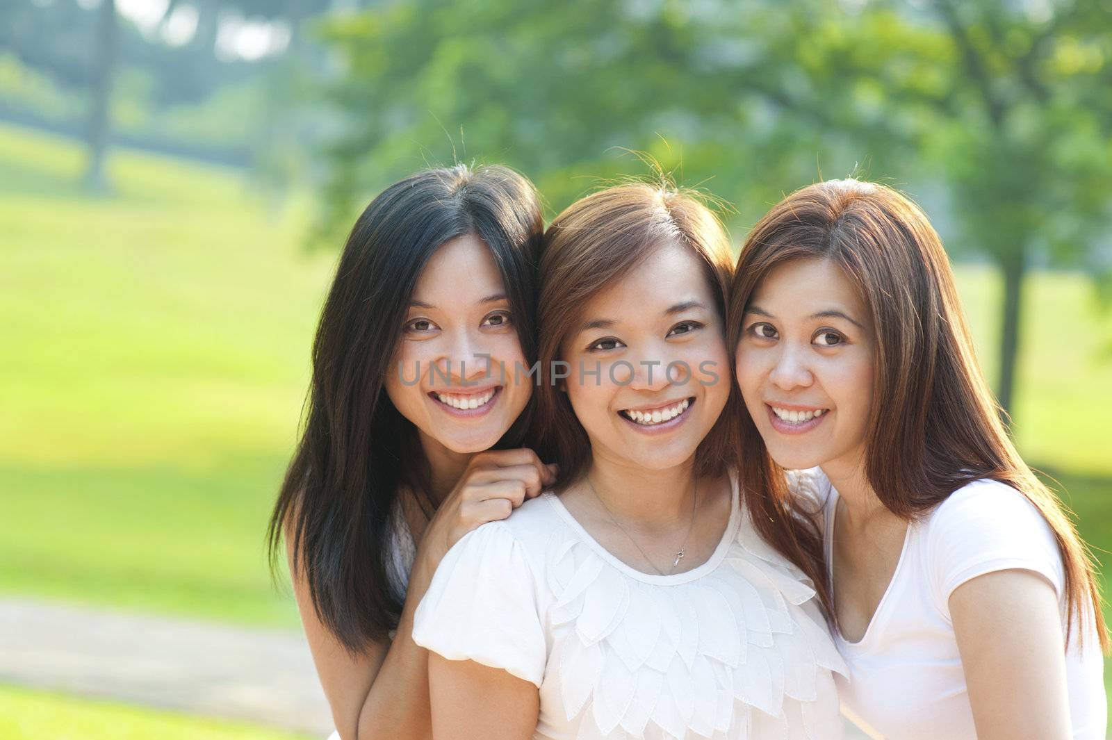 Asian young beautiful friends on vacation day, outdoor park