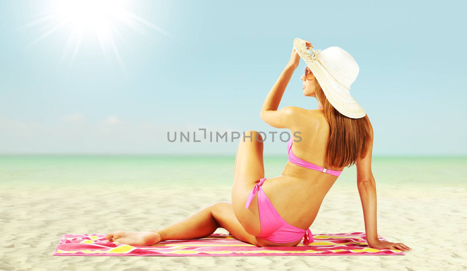 Charming woman on the beach