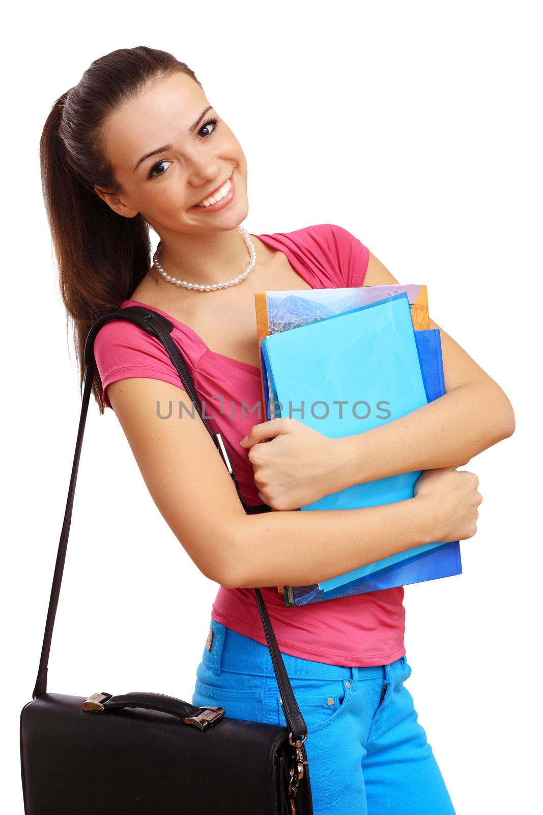 Happy smiling student standing and holding books