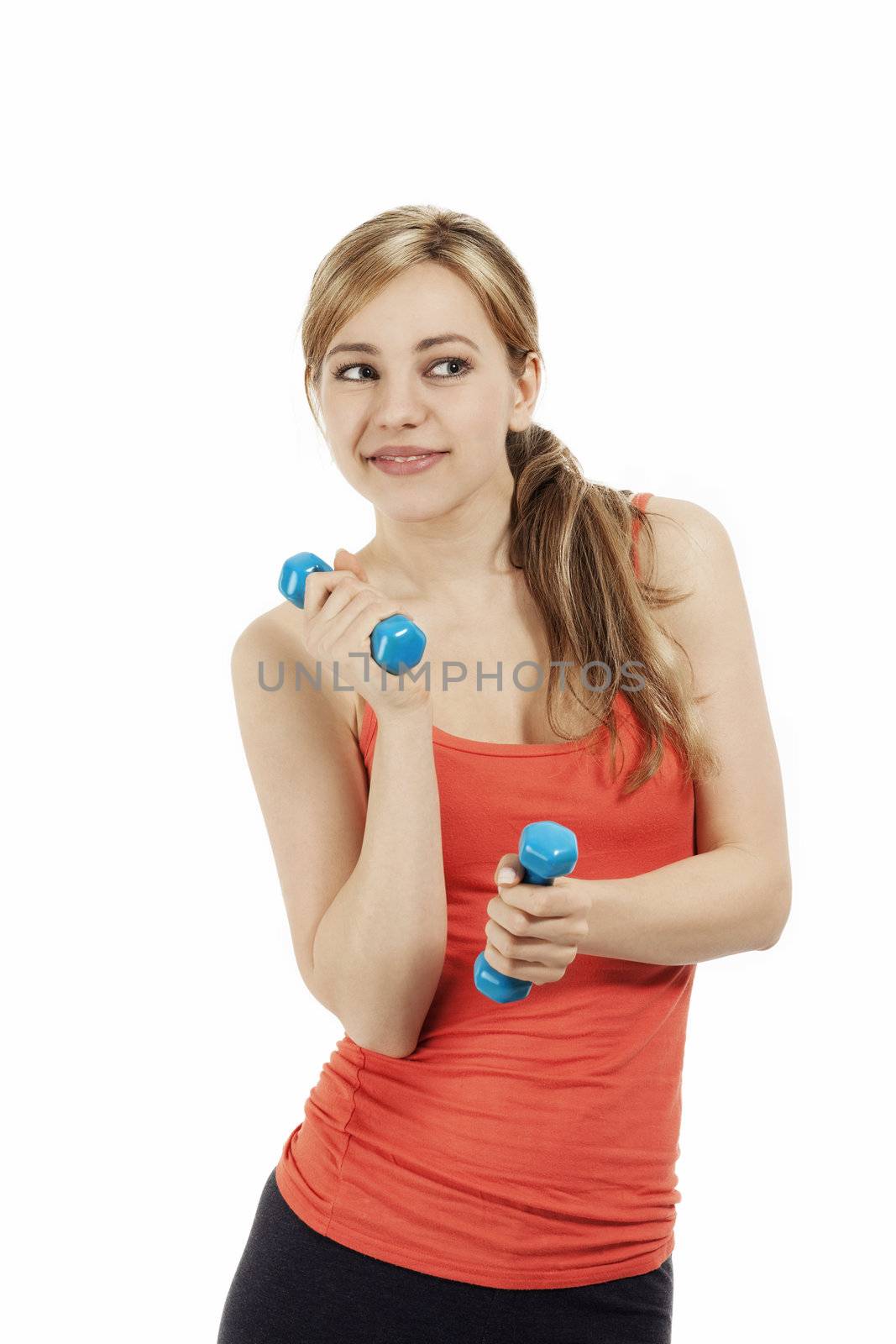 cute fitness woman playing with dumbbells on white background