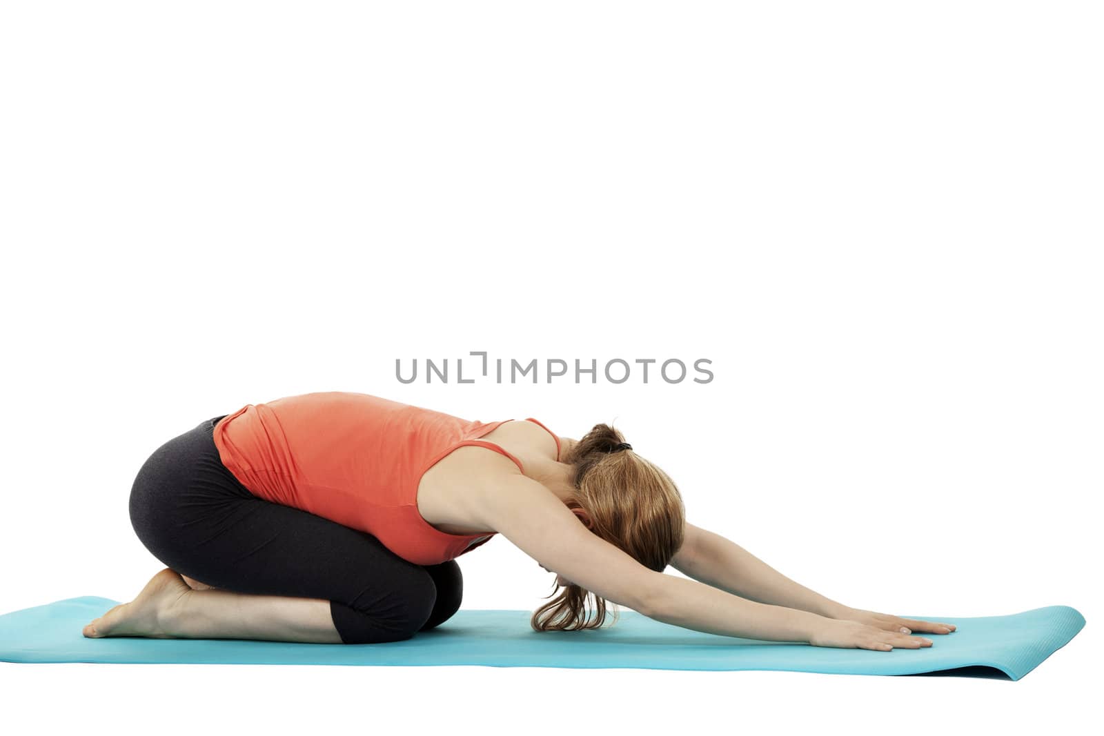 exercising fitness woman on a blue mat on white background