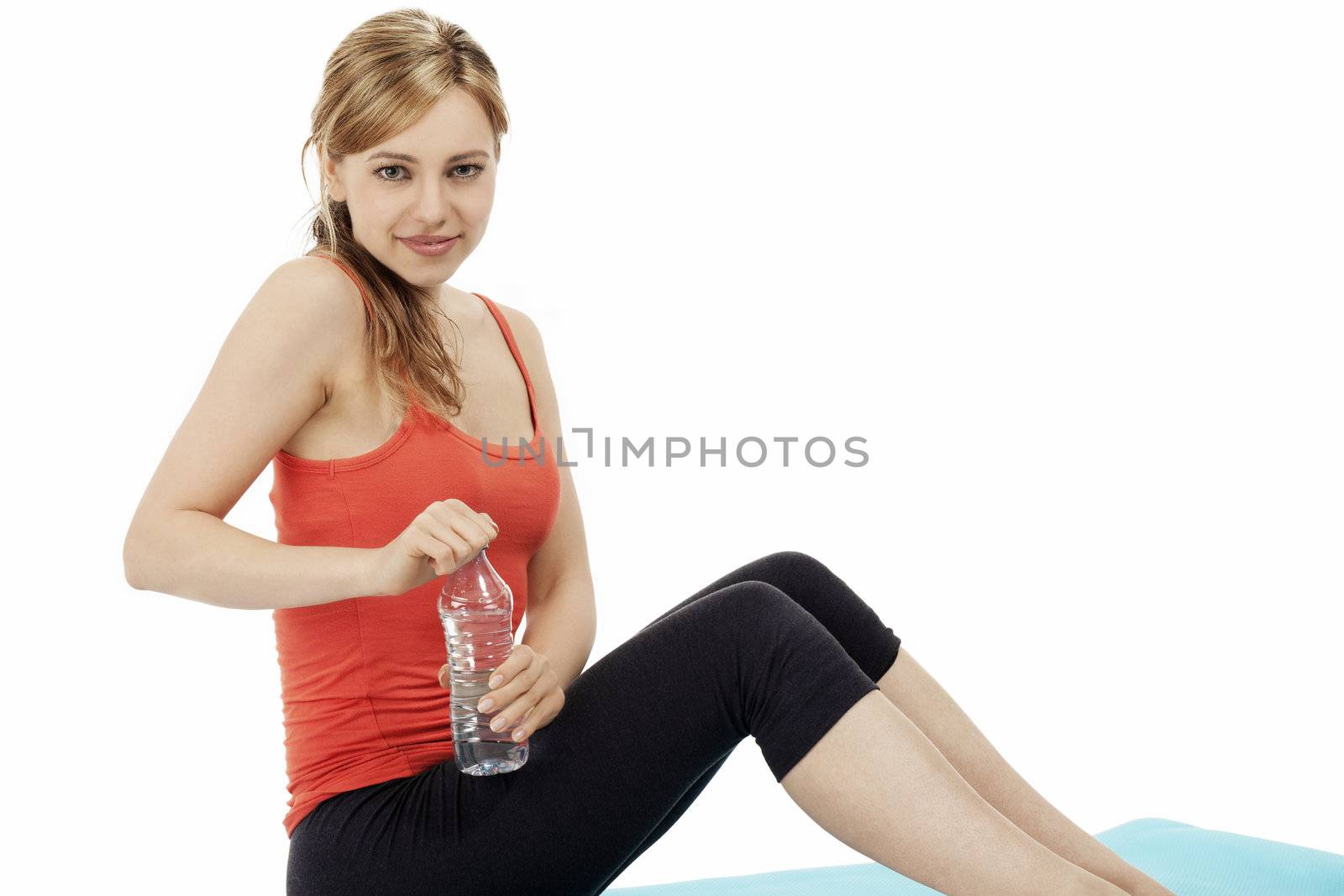 blonde sitting fitness woman opening a bottle of water by RobStark