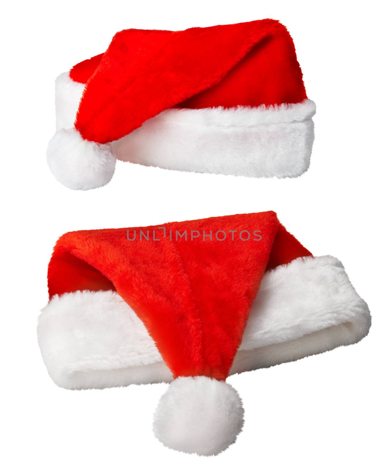 Red Christmas Santa Claus hats isolated on white background
