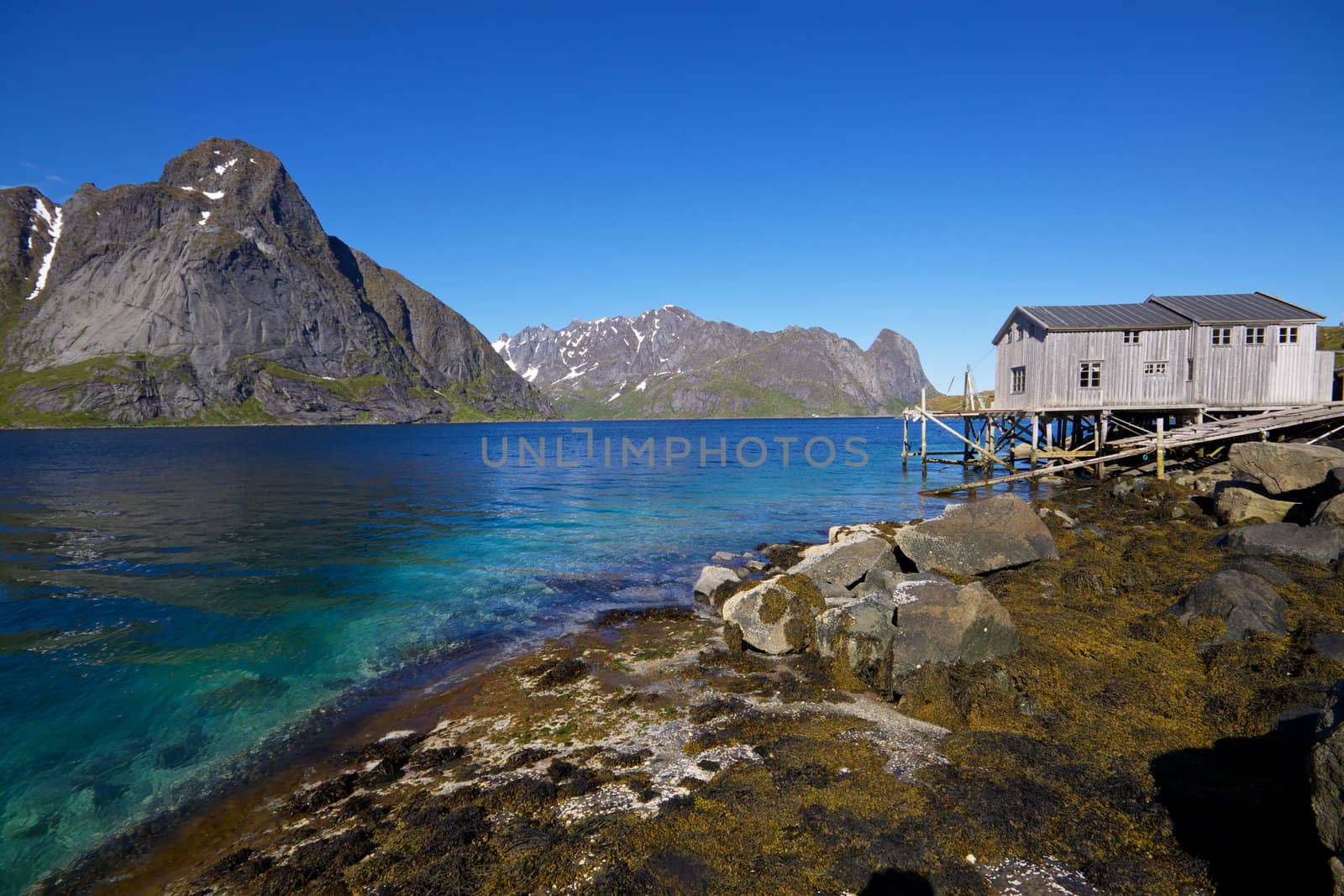Panorama with old fishing port by the fjord on Lofoten islands in Norway