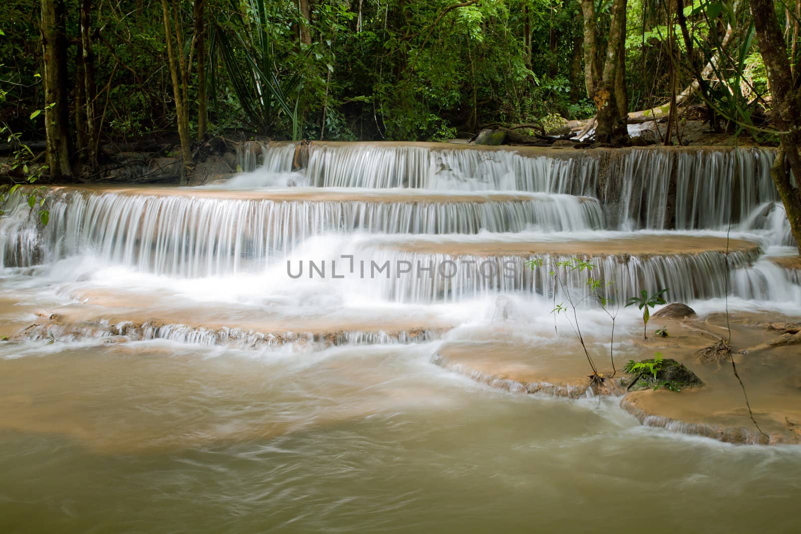 Beautiful Tropical Rain forest Waterfall in National Park in Thailand