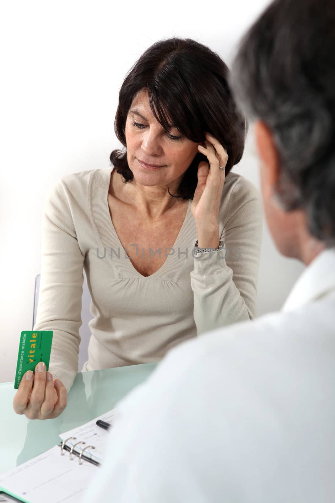 female patient in doctor's surgery