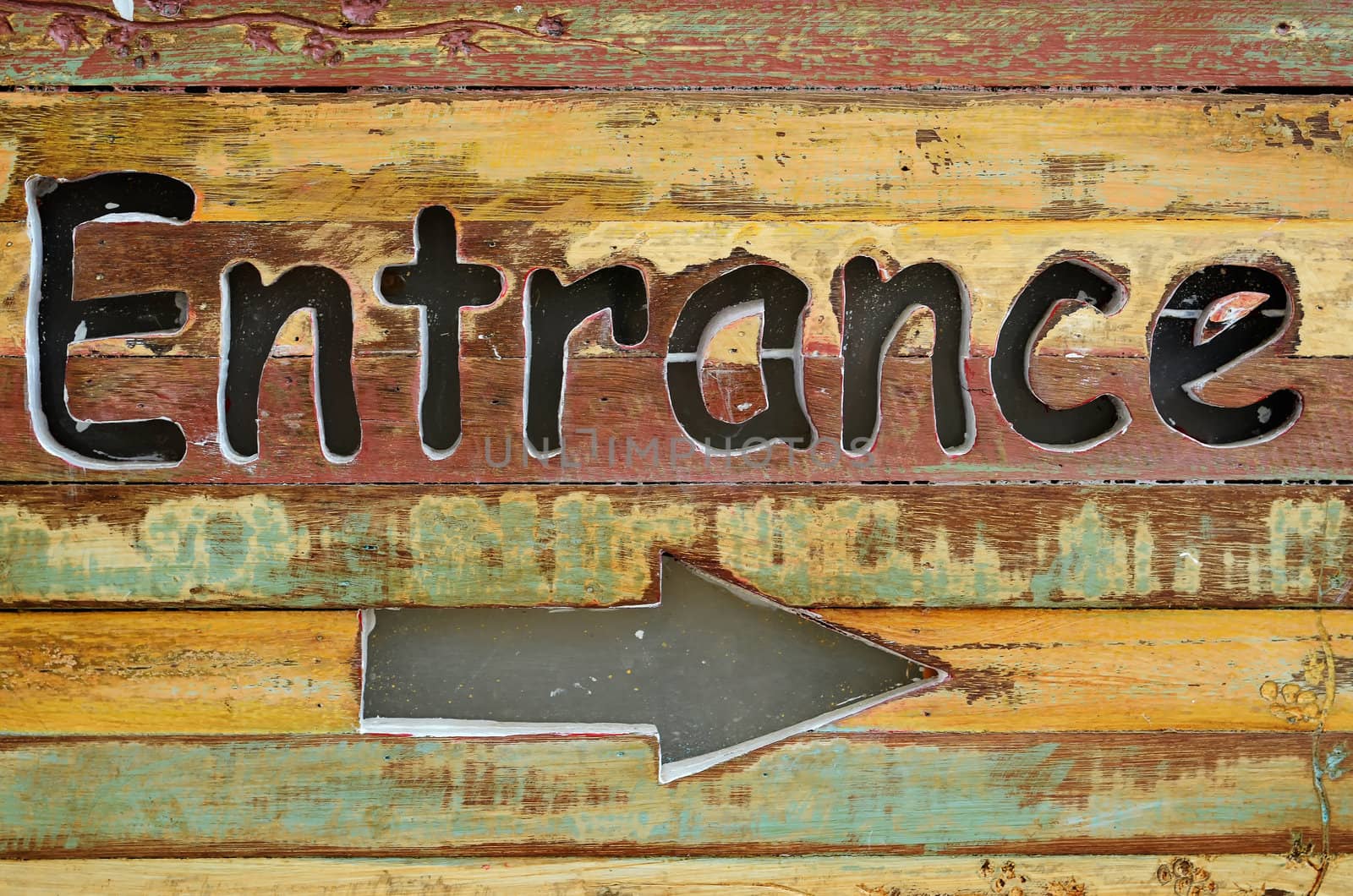 "Entrance" wood sign by nuttakit