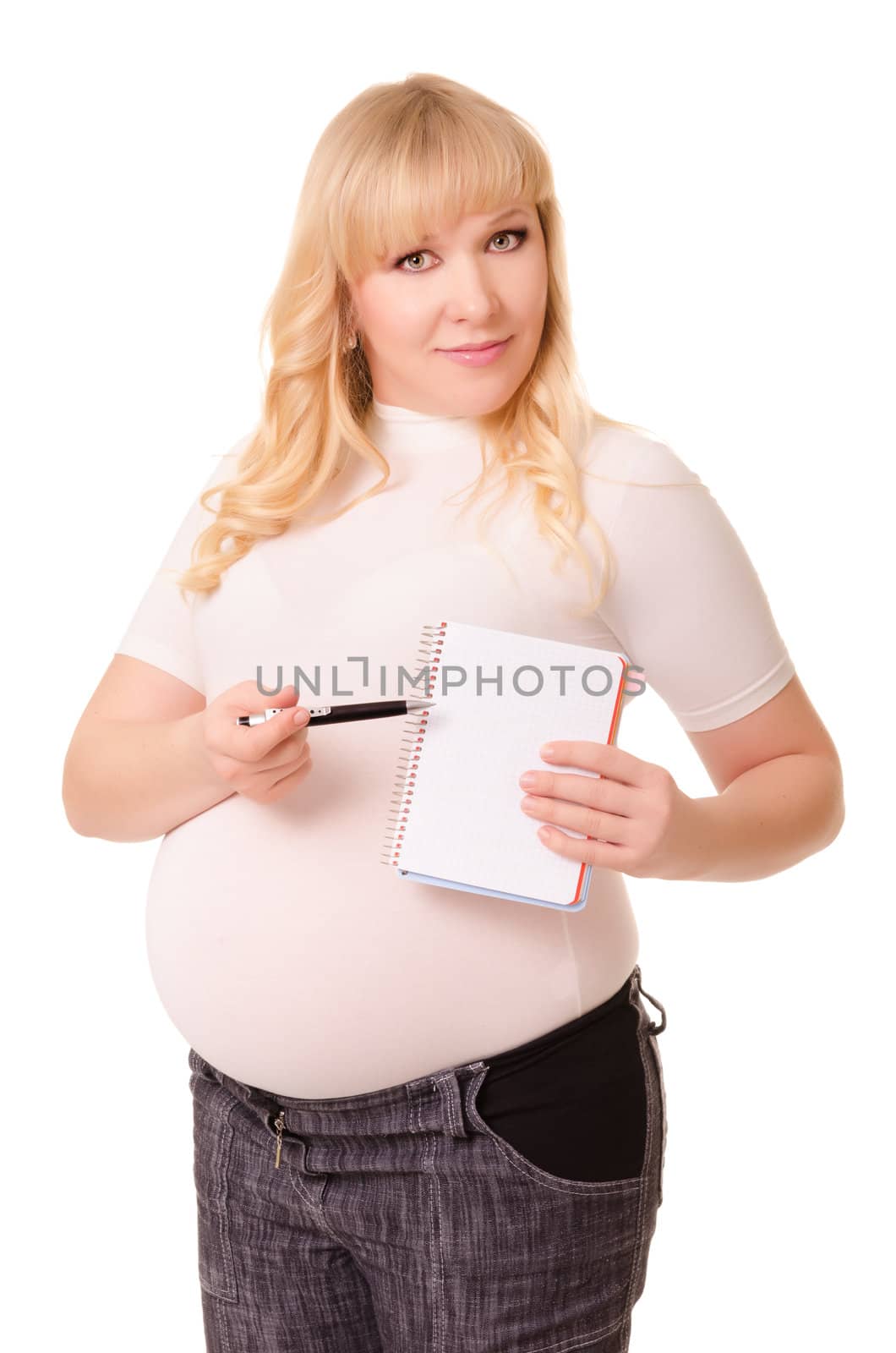 Pregnant woman showing a notebook and pen by iryna_rasko