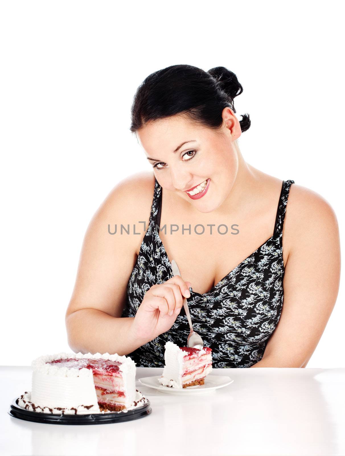 chubby woman eating slice of cake, isolated on white