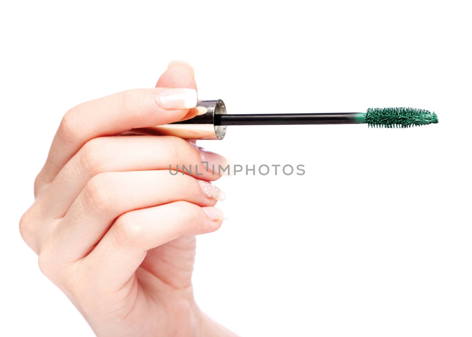 Mascara in woman's hand, isolated on white