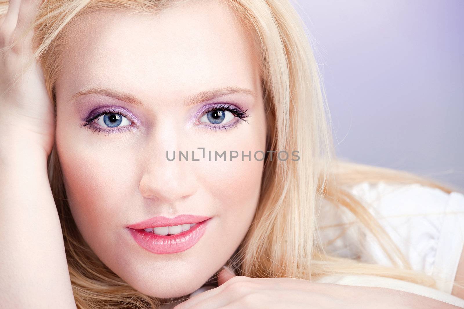 Pretty blond woman with blue eyes