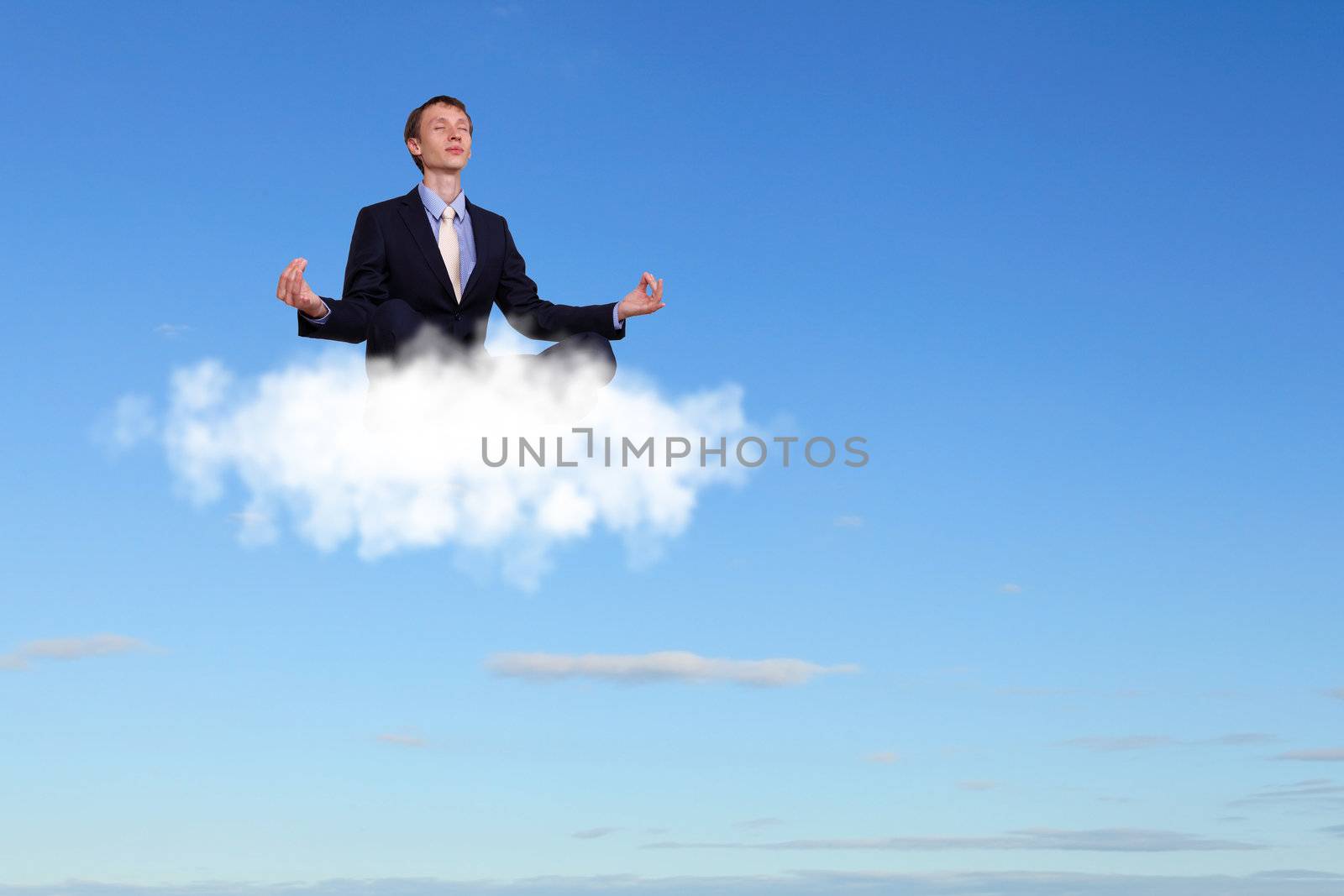 Businessman meditating sitting on the cloud by sergey_nivens