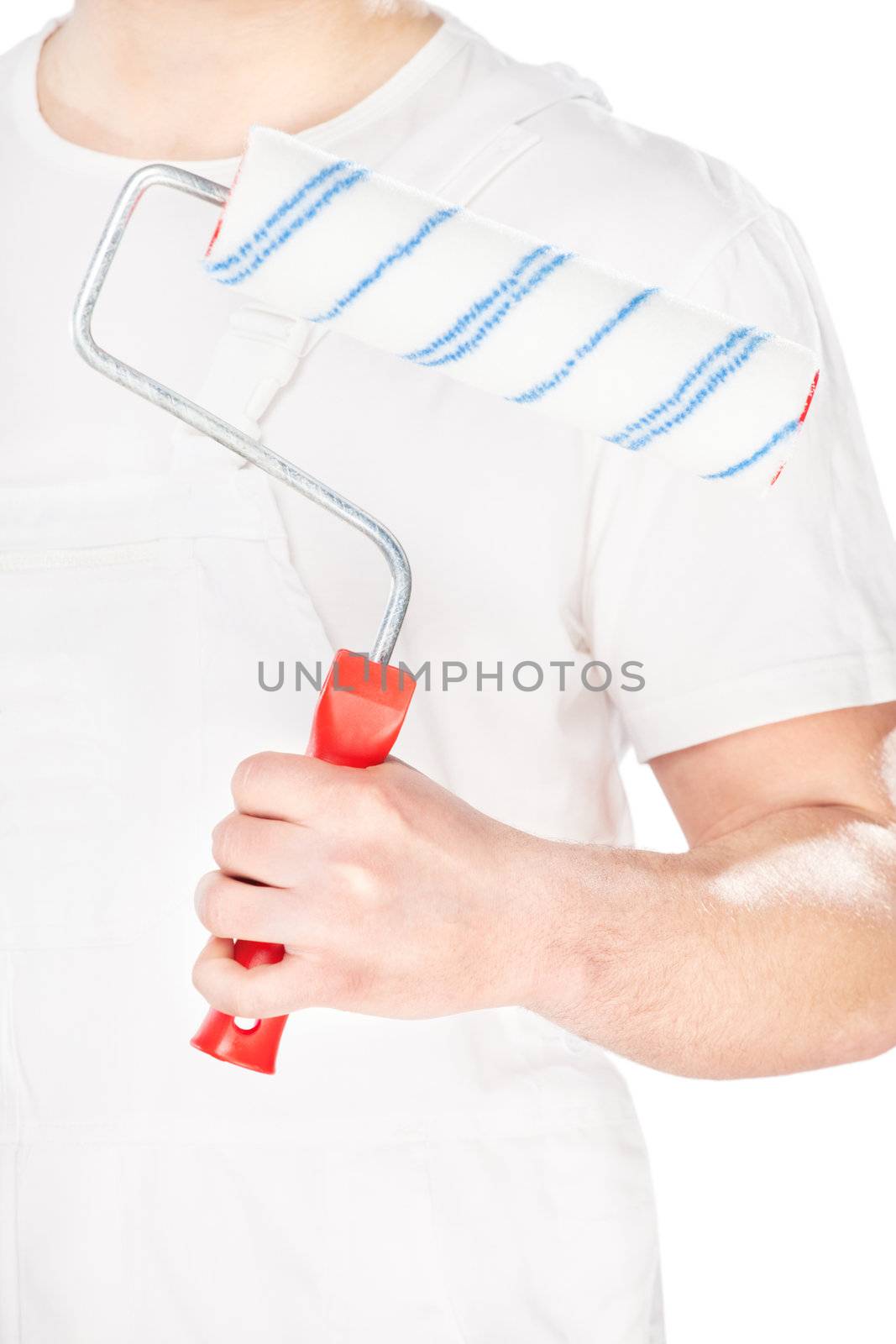 paint roller in hand of a worker, isolated on white