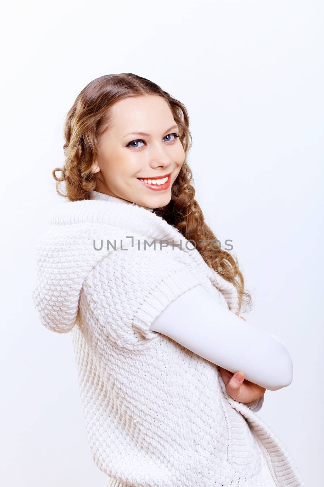 Young woman wearing warm sweater by sergey_nivens