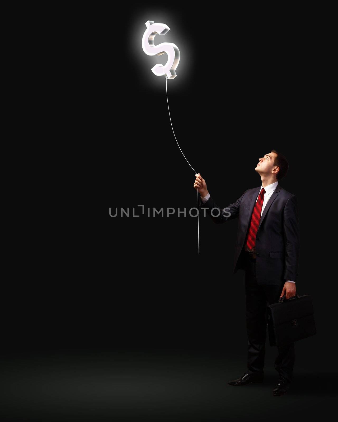 Light bulb and a business person as symbols of creativity in business