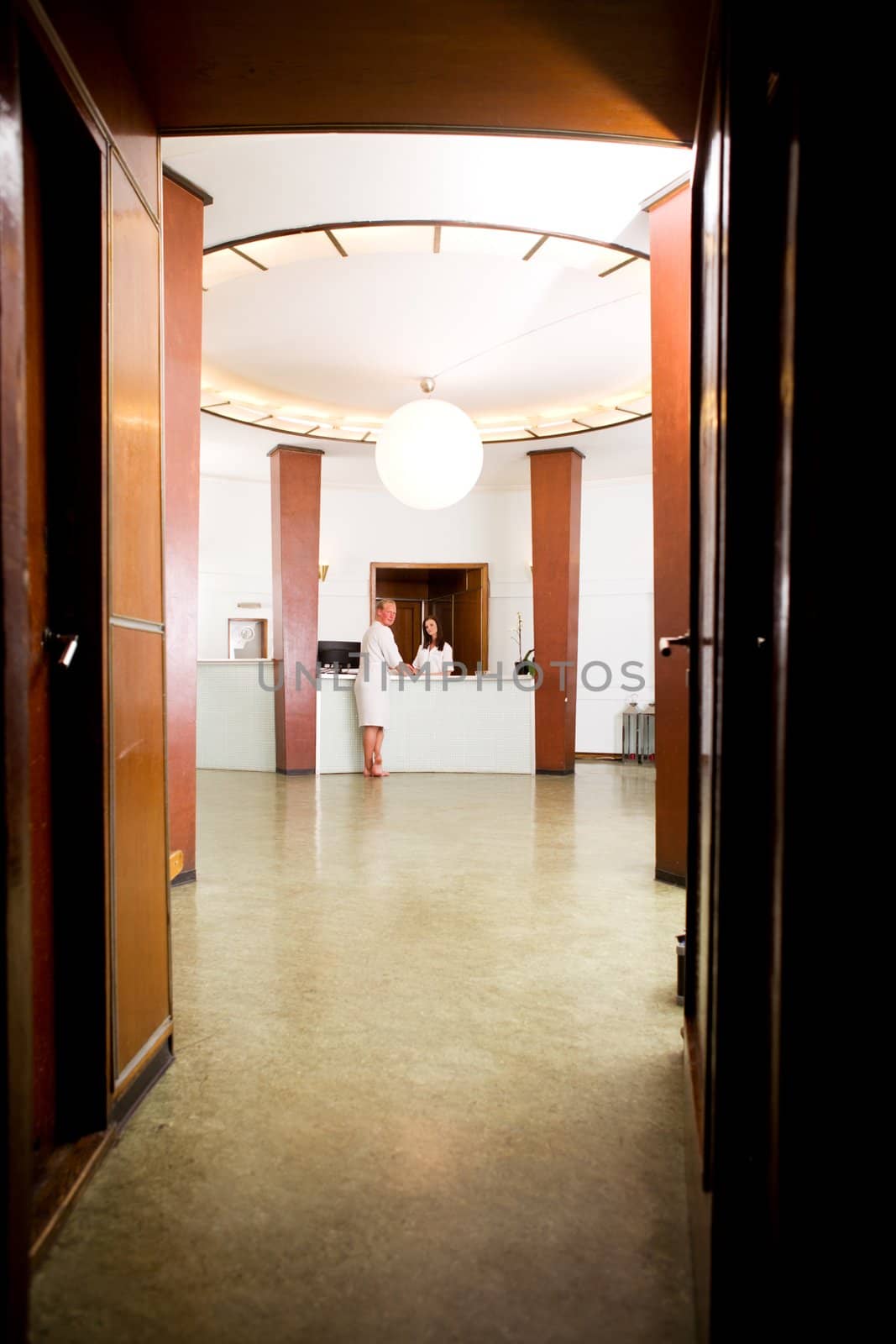 Man in Spa Reception by leaf