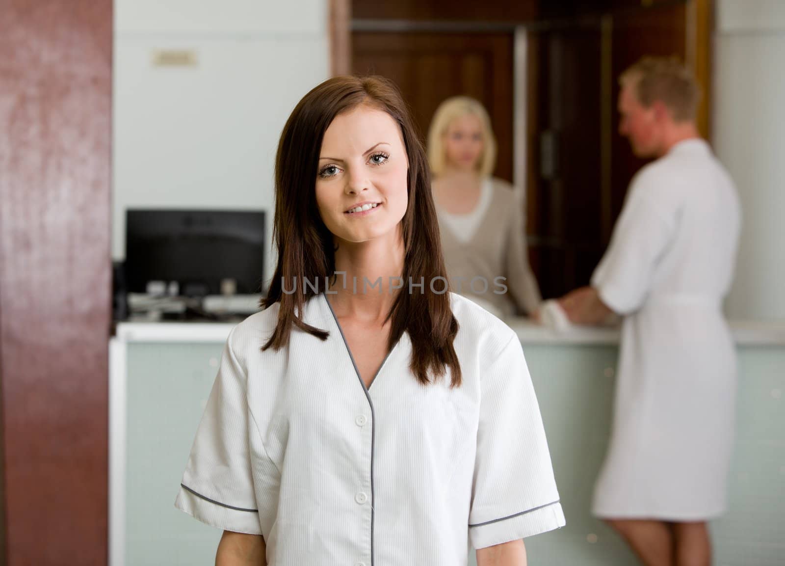 Portrait of a spa therapist in a reception interior