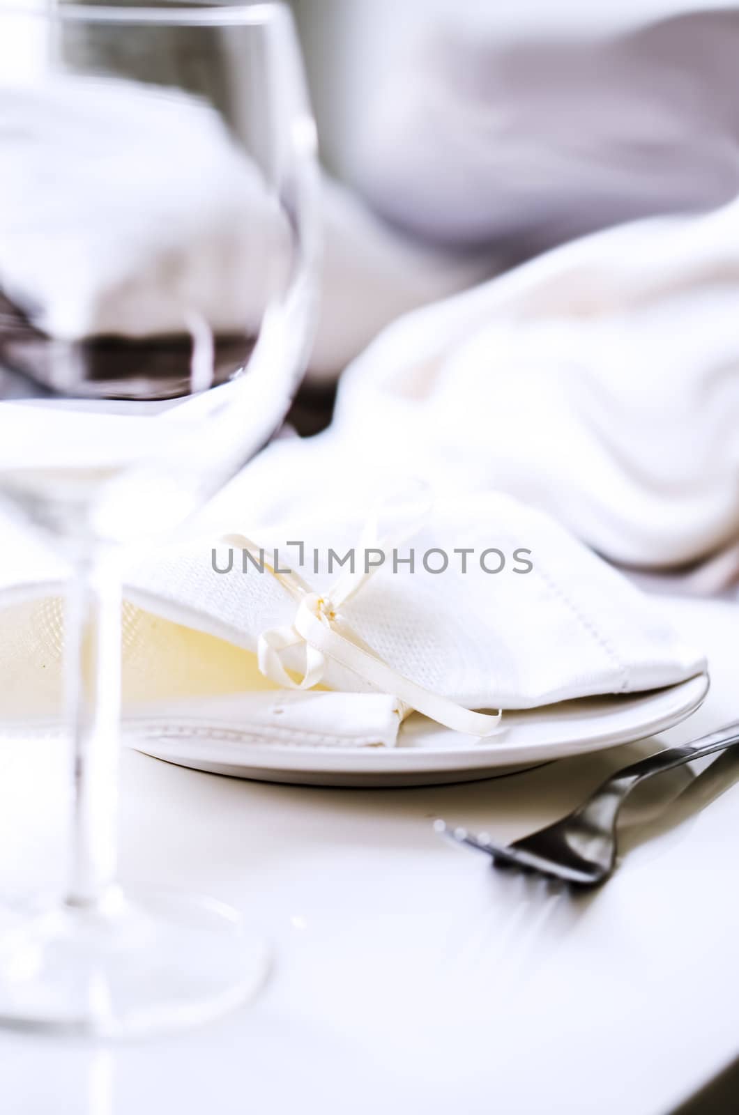 Tables set for meal in restaurant by Nanisimova
