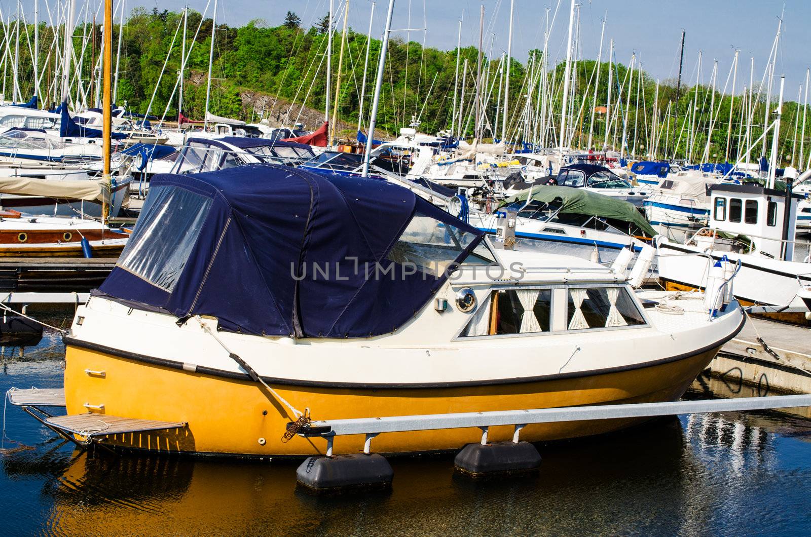 Old yellow boat  in the harbor Oslo, Norway