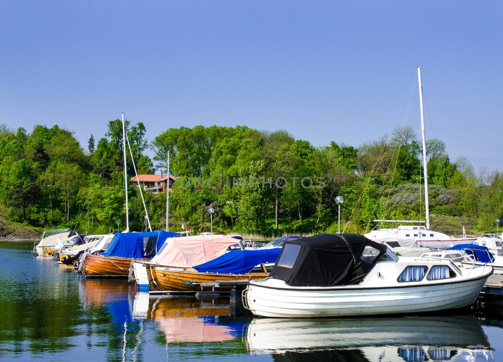 Boats  in the harbor  by Nanisimova